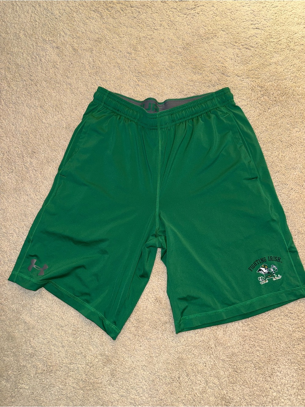 Under Armour Notre Dame Men’s Green Athletic Shorts with Fighting Irish Logo